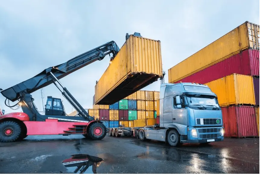 Crane shifting load to cargo truck